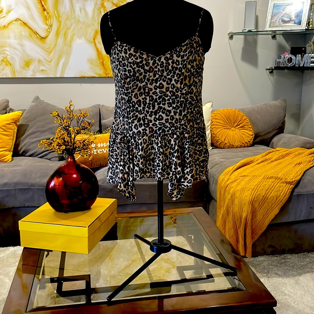 Guess cheetah print peplum top. Size L